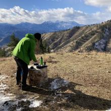 Setting up on a stump at the summit