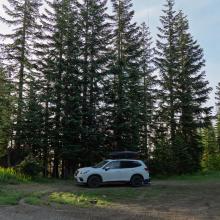 There is a decent place to park and camp if you don't want to brave the road to the top.